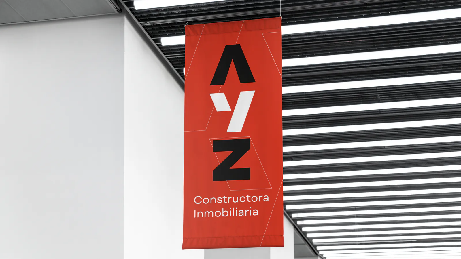 Banner vertical rojo de AYZ Constructora Inmobiliaria por Follow Me Agency