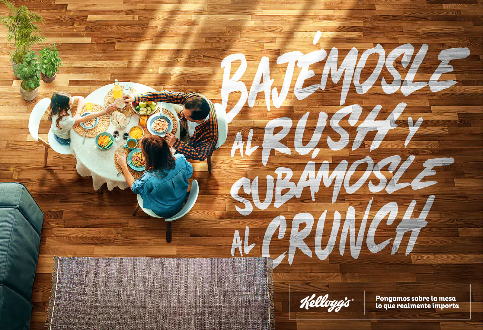 Pieza de la campaña Kellogg's de Follow Me Agency: familia desayunando en plano cenital sobre piso de madera con el mensaje Bajémosle al rush y subámosle al crunch